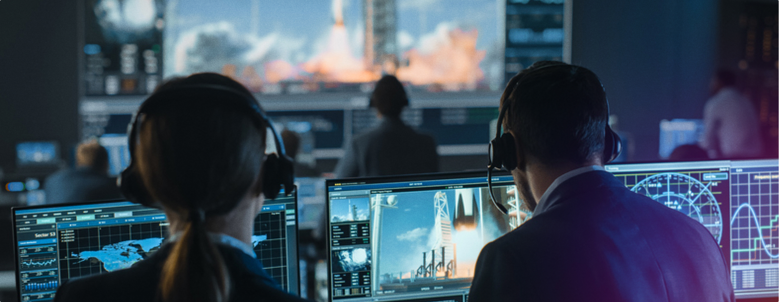 Man And A Woman Watching A Rocket Launch